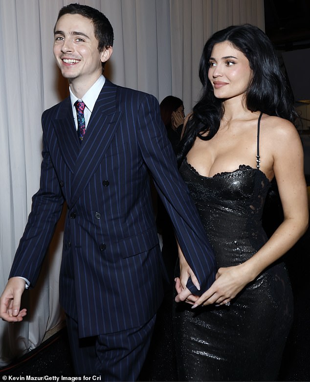 Darren said: 'In terms of Kylie and Timothee, one of the reasons they're being very overt with their gestures and declarations of love is something called social proof'