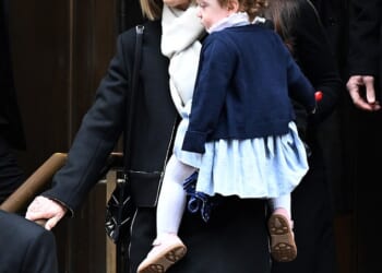Caroline Kennedy held her granddaughter as she attended the funeral of her daughter, Tatiana Schlossberg, in New York