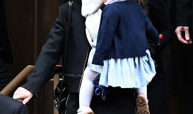 Caroline Kennedy held her granddaughter as she attended the funeral of her daughter, Tatiana Schlossberg, in New York