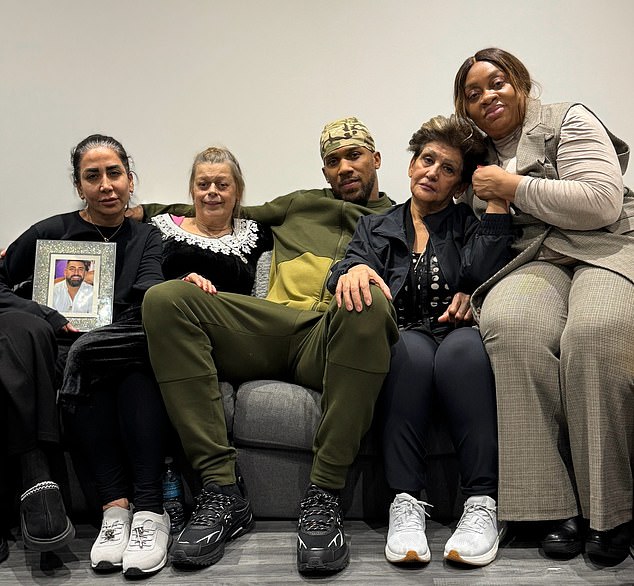 Anthony Joshua (centre) flanked by (left-to-right) Sina Ghami's sister, Latif Ayodele's mother, Sina's mother and his own mother in a picture the boxer posted to Instagram following the two men's funerals on Sunday