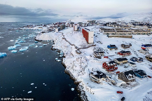 Snow-covered buildings in Nuuk, Greenland, on March 7, 2025