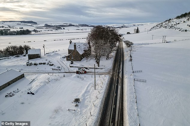 The A97 in the Aberdeenshire village of Rhynie on Tuesday amid severe snowy and icy conditions