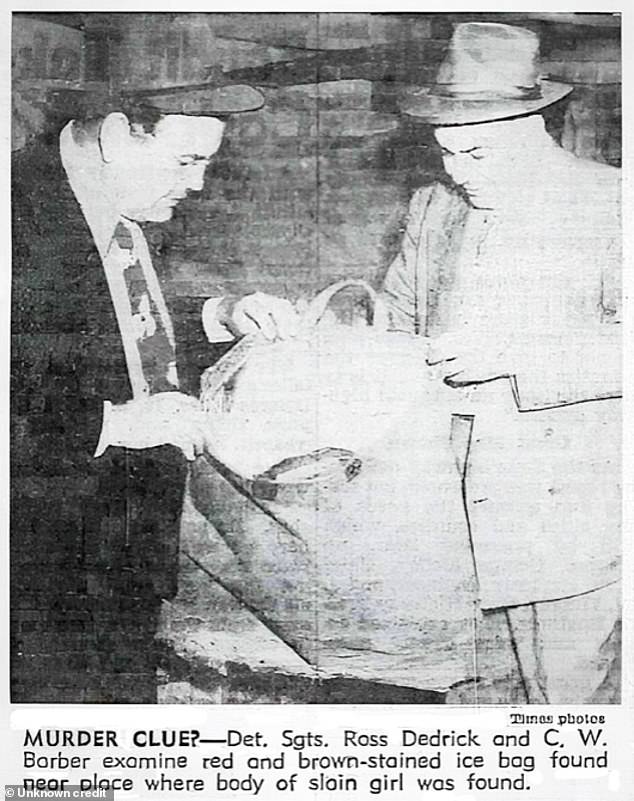 A photo in a newspaper shows police officers looking at a canvas iceman¿s bag marked with a letter ¿Z¿ found close to where Short's body was found. Baber believes this supports his theory about the Zodiac Motel