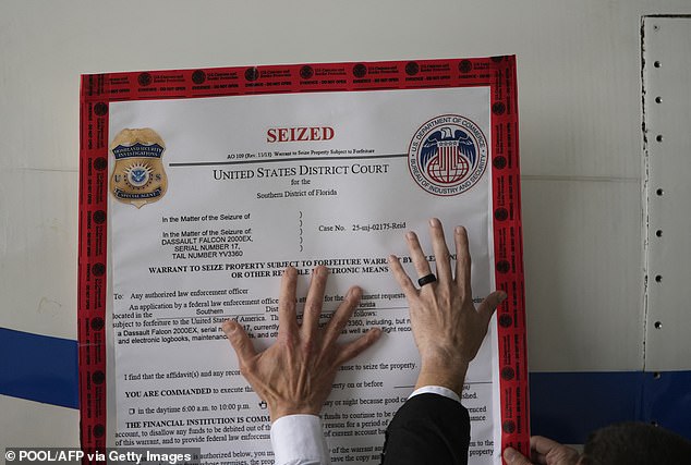 A "seized" sign is placed on a Venezuelan government airplane during a press conference where US Secretary of State Marco Rubio announced its seizure at La Isabela International Airport in Santo Domingo, on February 6, 2025