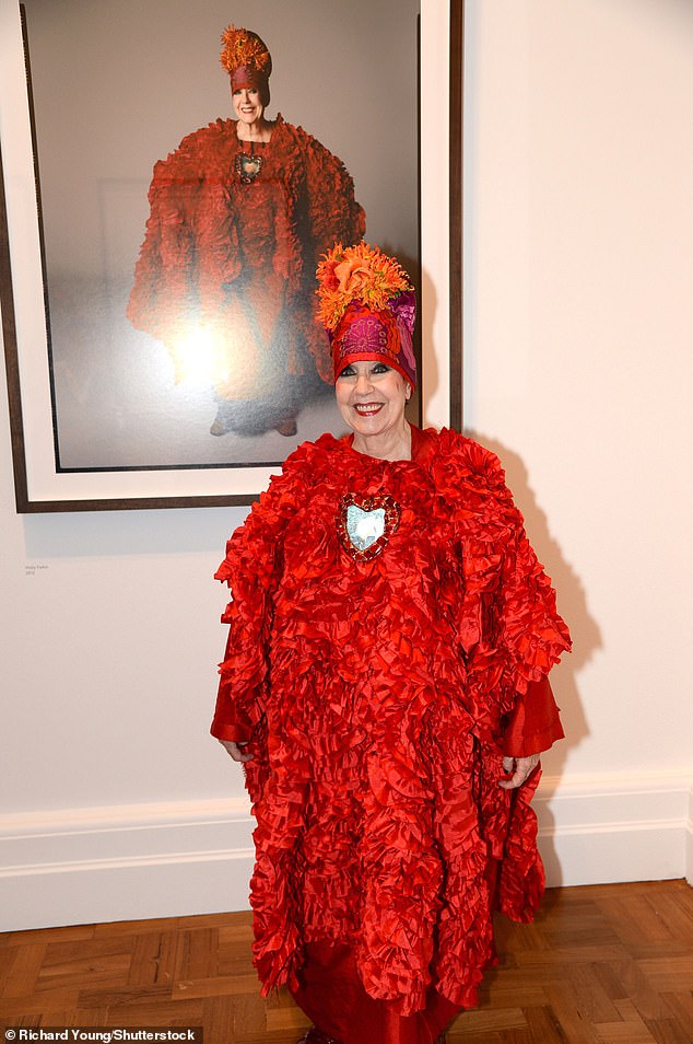 Molly Parkin with a photograph of herself by David Bailey in London on February 3, 2014