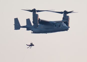 RAF fighter jets scrambled to intercept a Venezuelan oil tanker in the Atlantic yesterday as the US plotted a dramatic mission to seize it. Pictured: A CV-22B Osprey was seen practicing winching exercises off the coast of Felixstowe
