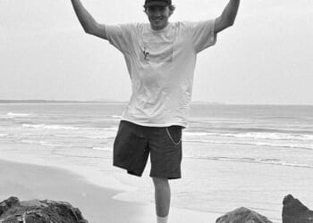 Recalling the attack, Kai McKenzie (pictured) said he repeatedly trying to kick the shark away before finally catching a wave to shore where a former police officer raced to help him