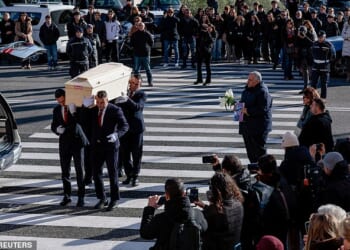 Pallbearers carry the coffin of 16-year-old Riccardo Minghetti, who died at the "Le Constellation" bar in Crans-Montana, Switzerland during a New Year's Eve party, during his funeral at the Basilica of Saints Peter and Paul in Rome, Italy, January 7, 2026