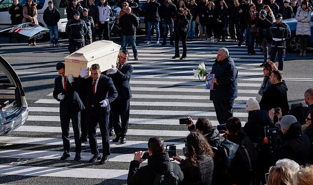 Pallbearers carry the coffin of 16-year-old Riccardo Minghetti, who died at the "Le Constellation" bar in Crans-Montana, Switzerland during a New Year's Eve party, during his funeral at the Basilica of Saints Peter and Paul in Rome, Italy, January 7, 2026