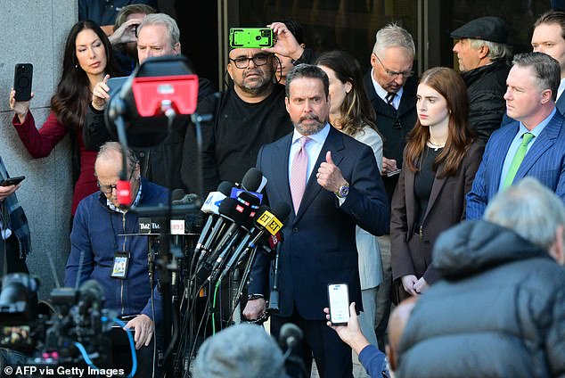 Nick's defense attorney, Alan Jackson (shown holding a press conference after the hearing)  stunned observers by announcing his withdrawal