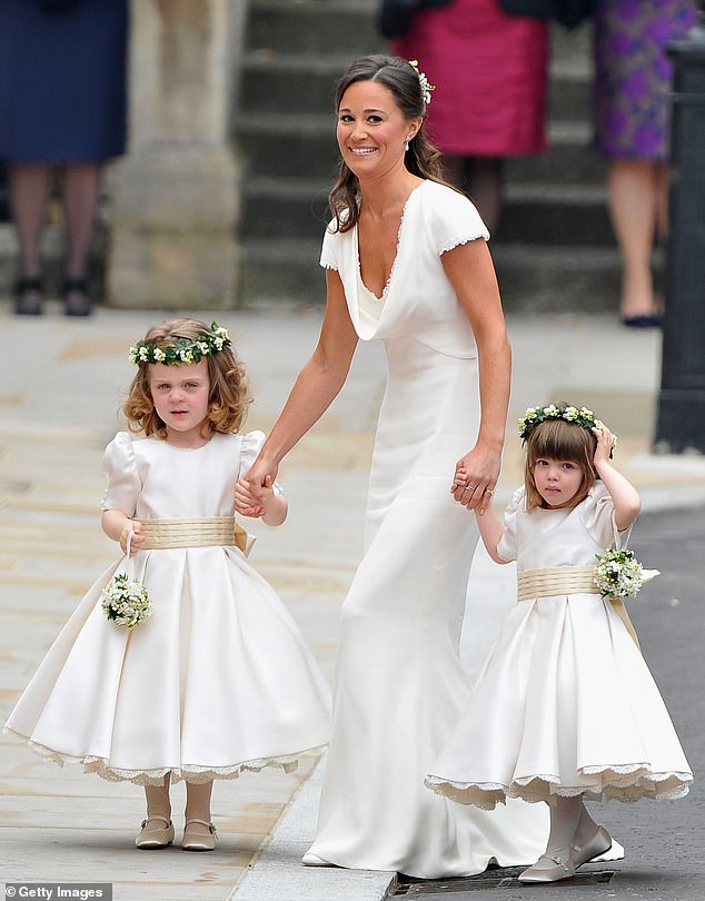 Kate's sister Pippa was maid of honour at her wedding and just like Kate's wedding gown, it was designed by Sarah Burton. The slinky gown featured capped sleeves, 58 buttons that ran all the way down the back and caught the world's attention due to the way it hugged her bottom