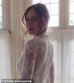 Holly wore her hair in an up-do, just like the princess has worn many times before