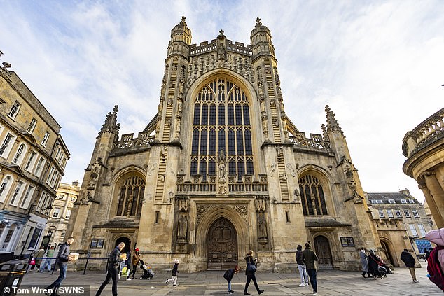 A grand dress requires a grand venue and Holly chose a grand venue which was equally steeped in history - Bath Abbey, (pictured)