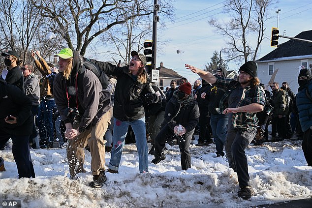 Protesters also threw snowballs at federal agents as tensions between the government and the Democratic city have heightened
