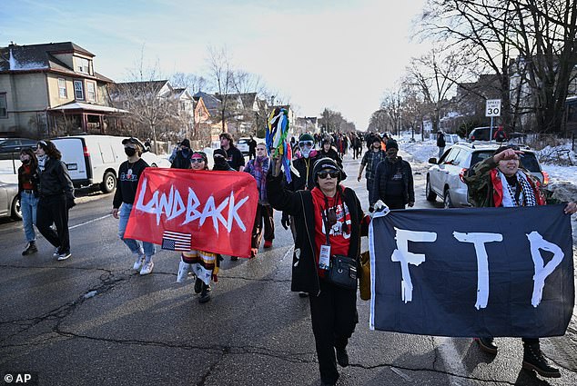 Others took the streets waving flags that read 'FTP', standing for 'F** The Police'
