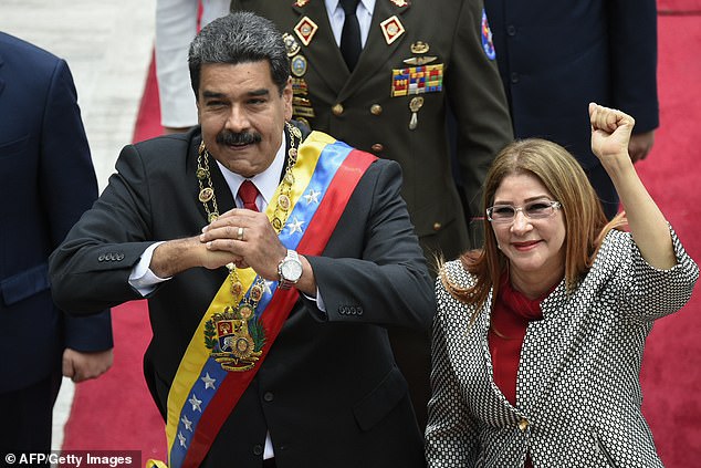 Maduro and Flores pictured at an inauguration ceremony in 2018. She preferred the revolutionary moniker First Combatant to First Lady