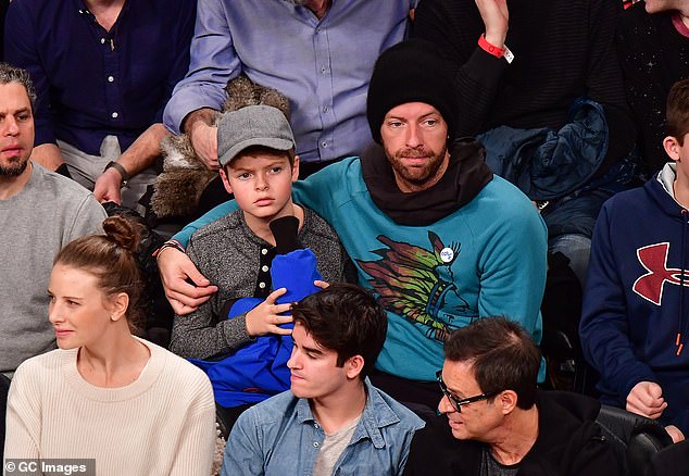 Having grown up with an actress mother and Coldplay frontman father, it's no wonder the pair look set to follow in the footsteps of their parents (Moses pictured with Chris in 2016)