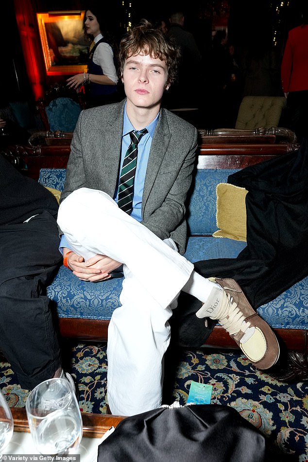 Moses is following in his Coldplay star father's footprints, as part of a three-piece band called Dancer