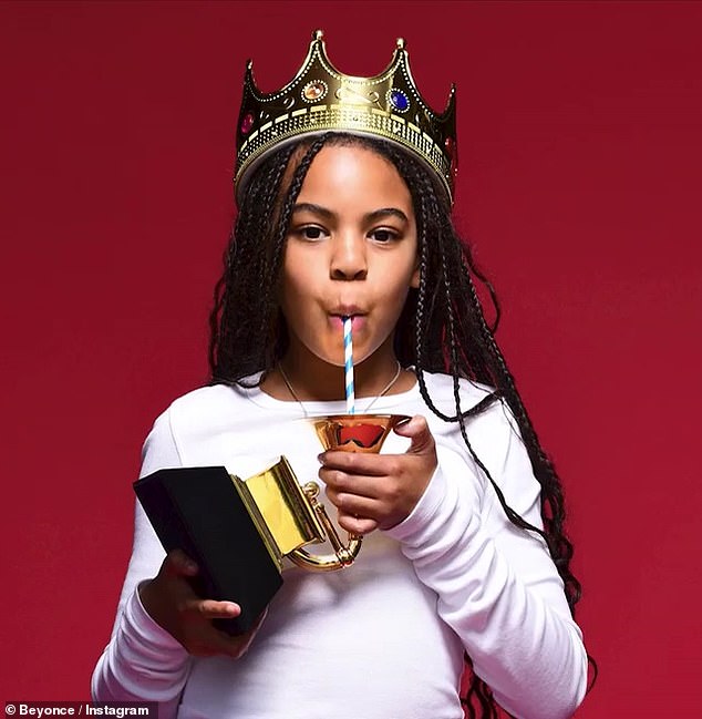 Unlike most, Blue Ivy has experienced more in her 14 years on earth than many adults would in their entire lives (pictured with her Grammy Award)
