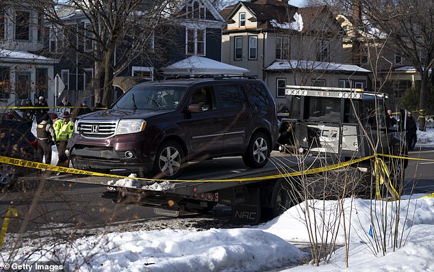 Her car was towed away from the scene after the shooting on Wednesday
