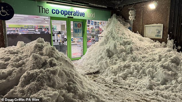 Handout photo of snow outside the local Co-Op, in Insch on Tuesday. The village in Aberdeenshire has seen 30cm (just under 1ft) of snow. Issue date: Wednesday January 7, 2026. PA Photo. Photo credit should read: Doug Griffin /PA Wire NOTE TO EDITORS: This handout photo may only be used for editorial reporting purposes for the contemporaneous illustration of events, things or the people in the image or facts mentioned in the caption. Reuse of the picture may require further permission from the copyright holder.