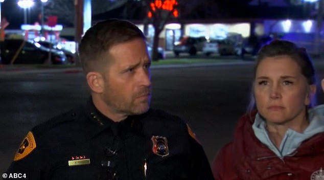 Salt Lake City Police Chief Brian Redd, left, and the city's mayor Erin Mendenhall gave a joint press conference late on Wednesday night