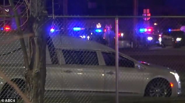A hearse could be seen leaving the scene of the shooting following the killing of two people in the church parking lot