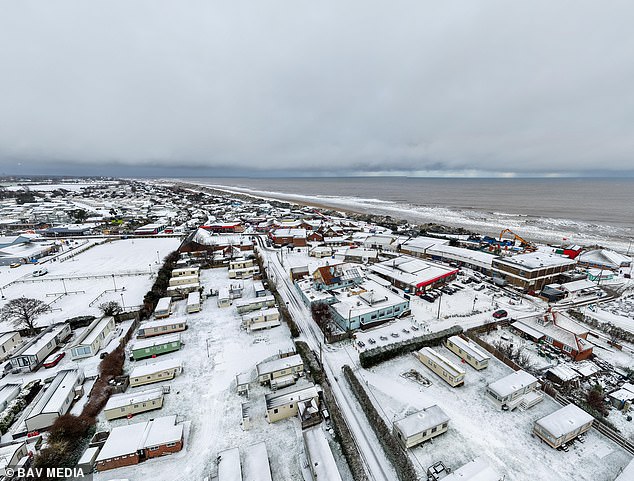 Hemsby: The 21-hour storm will hit from 3pm today until 12pm tomorrow - with the most snow in the Midlands and Wales, where 30cm (1ft) could fall