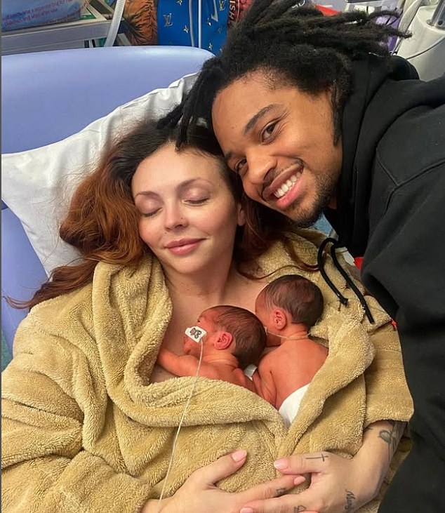 Jesy with her twins and partner Zion Foster. The couple have been together since 2022
