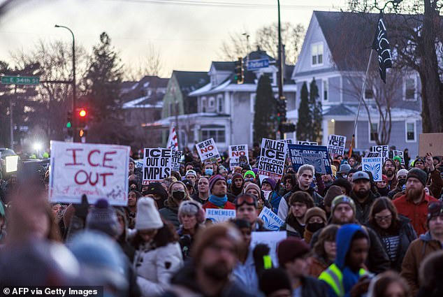 People demonstrate against ICE in Minneapolis. Activists have taken to the streets and pelted law enforcement with snowballs