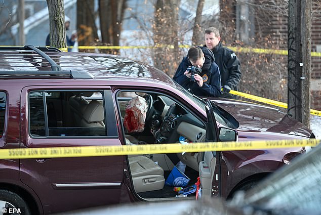 The remains of the SUV with a bloodied airbag after Good was rushed to hospital