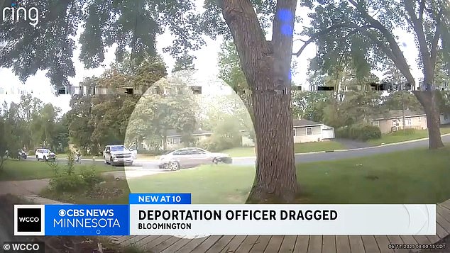 The officer was dragged more than 100 yards, the DOJ said