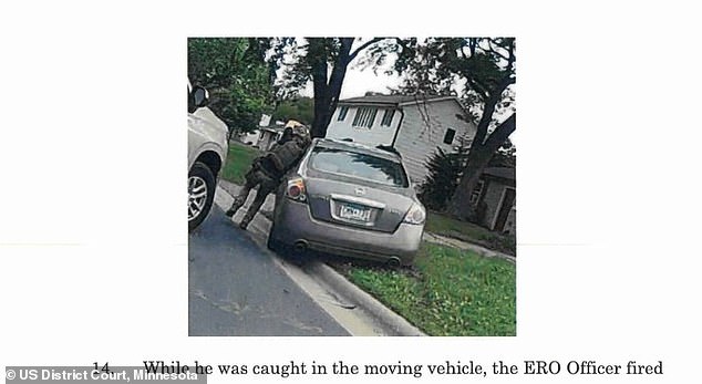 The officer after being dragged 100 yards with his arm stuck in the car