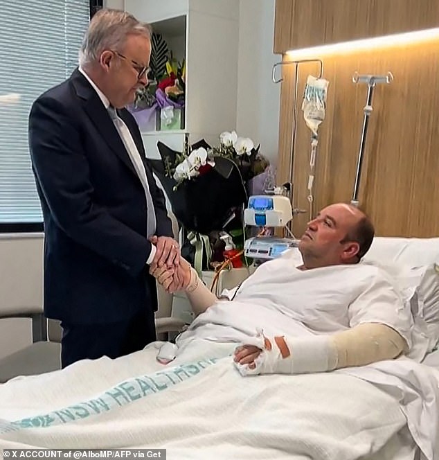 Mr Ahmed (pictured meeting Anthony Albanese in hospital) wrestled a gun away from an attacker during the Bondi shooting