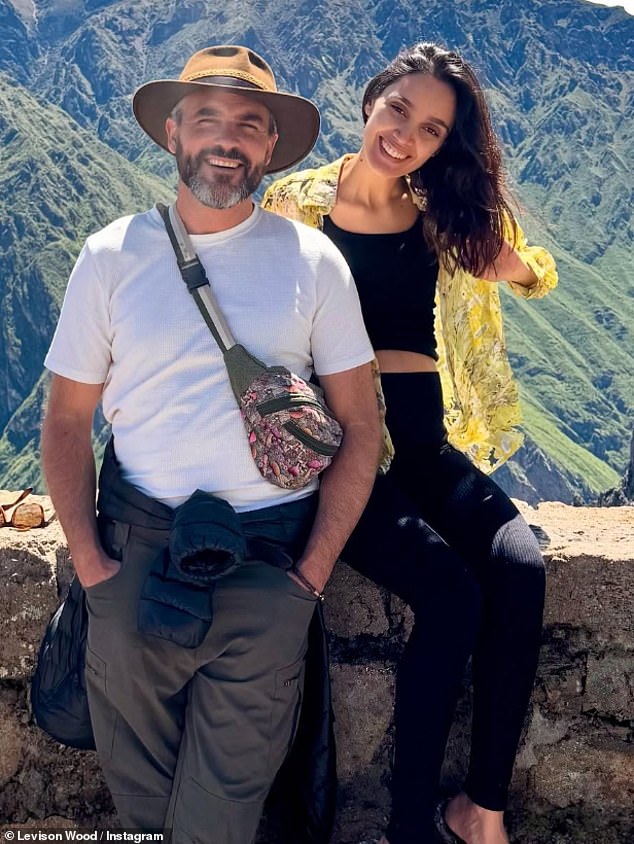 Levison pictured with his girlfriend Ana Protasio, a model and yoga instructor from Brazil