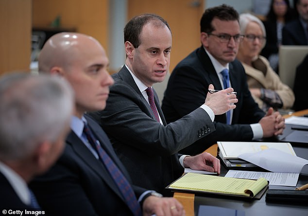 White House Staff Secretary and NCPC Chairman Will Scharf (center) asked the public to keep the peace at the top of the meeting, as President Donald Trump's ballroom project has attracted 'passionate comments on both sides'