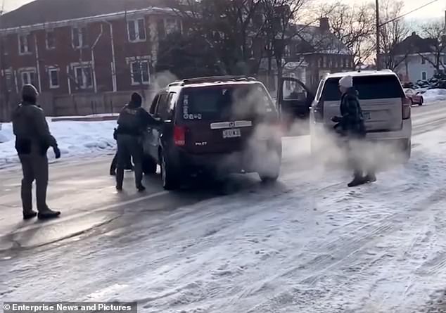 A vehicle striking, running over, or dragging an officer can inflict serious injury, which can justify the use of deadly force