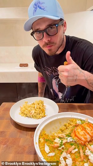 The former photographer also plugged his Cloud 23 hot sauce by wearing one of the brand's baseball caps in the video