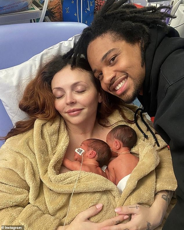 Jesy (pictured after giving birth) with her twins and fiancé Zion Foster
