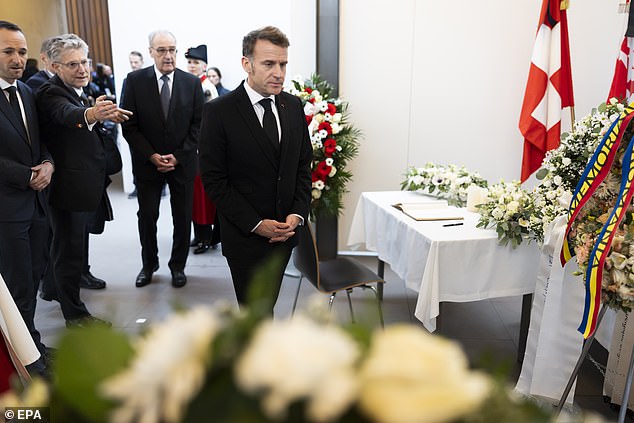 French President Emmanuel Macron (R) during his arrival prior to the official commemorative ceremony and the national day of mourning in Martigny, Switzerland, January 9, 2026
