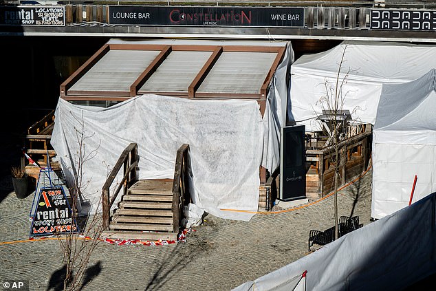Exterior view of the closed Le Constellation bar in Crans-Montana, Swiss Alps, Switzerland, Sunday, January 4, 2026, after a devastating fire in the bar left dead and injured during the New Year's celebration