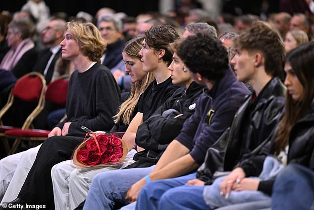 Mourners attend a memorial ceremony in tribute to victims of the Crans-Montana bar fire on January 9, 2026 in Crans-Montana, Switzerland