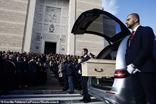 The coffin at the Basilica of Saints Peter and Paul in Rome during the funeral of Riccardo Minghetti - a 16-year-old victim of the bar-nightclub fire