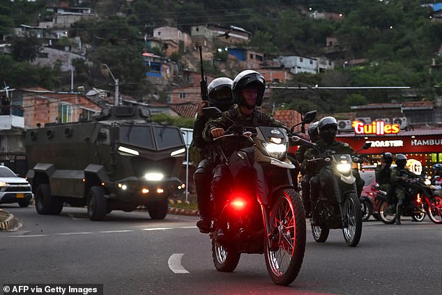 Colombian soldiers pictured patrolling near the border with Venezuela in Cucuta this week
