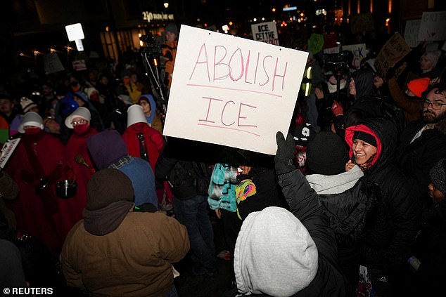 Around 100 State Troopers arrived on scene several hours into the protest. Demonstrators carried signs with anti-ICE slogans