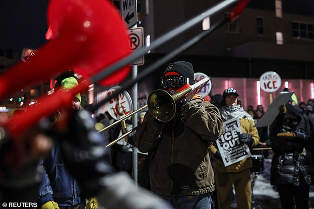 Demonstrators played instruments during the demonstration against increased immigration enforcement, just days after the fatal shooting of Renee Good