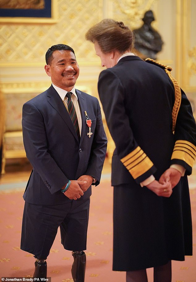 The veteran receives his MBE for services to disability awareness from the Princess Royal at Windsor Castle in 2024
