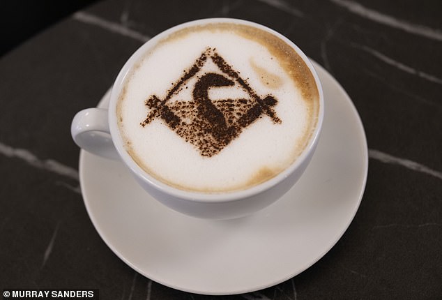 Even the cappuccinos served in the headquarters are adorned with a complex masonic symbol on the foam