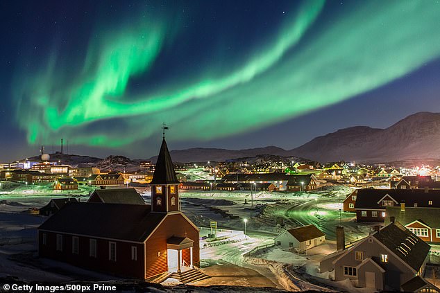 The Northern Lights, or aurora borealis, are seen above Nuuk in this file photo