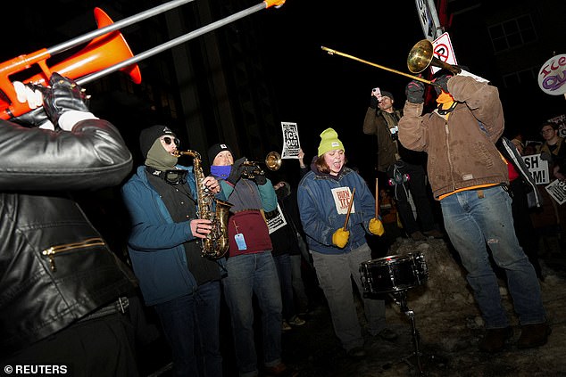 Protesters banged drums, pounded on windows and chanted profane anti-ICE songs as terrified guests cowered inside the hotel